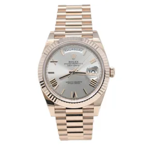 Rolex Men's Day-Date 18K Everose Gold 40mm Pink Sundust Roman Dial Watch Reference #: 228235
